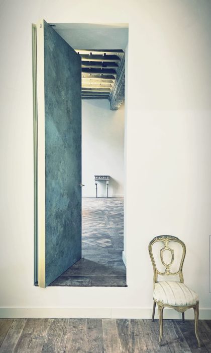 Il particolare ingresso al Salone delle udienze del Piano Nobile all'interno di Palazzo Saluzzo Paesana